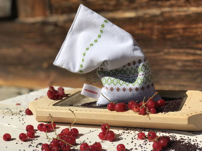 Wellness Säckli aus antikem Bauernleinen mit getrockneten Johannisbeerkernen Wellness Säckli aus antikem Bauernleinen mit getrockneten Johannisbeerkernen
